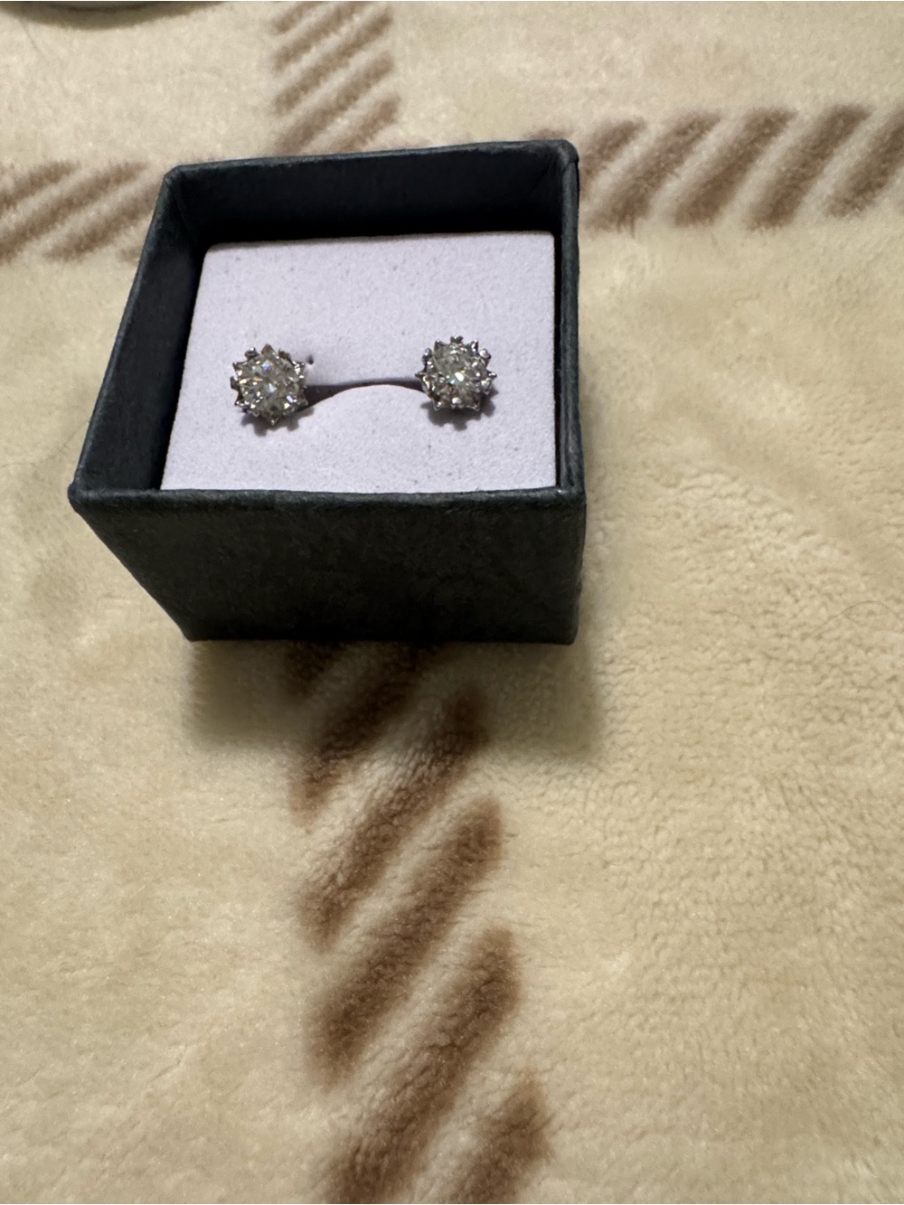 Diamond earrings with PT950 on backs and 925 on studs